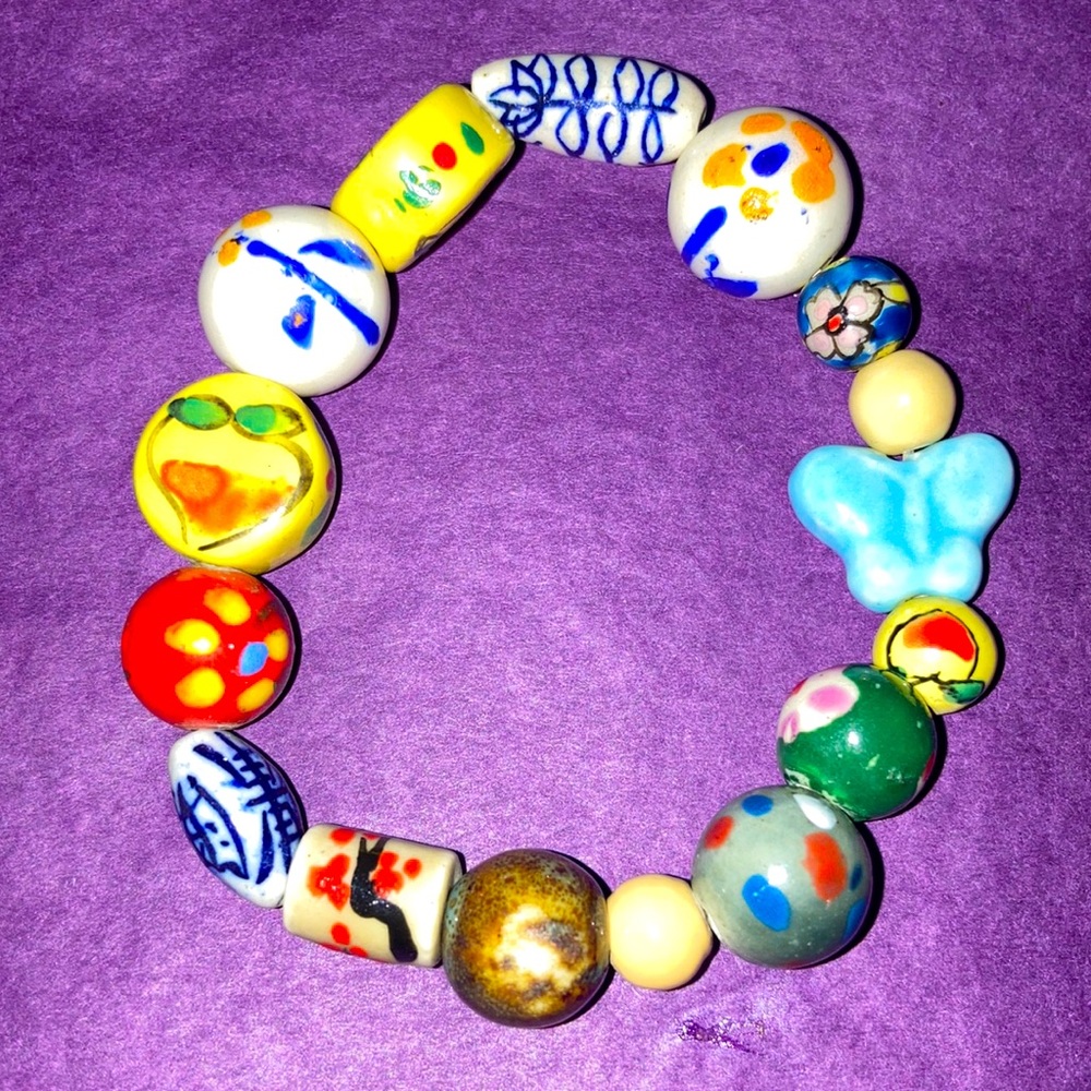 Ceramic bead spring flowers and butterfly bracelet